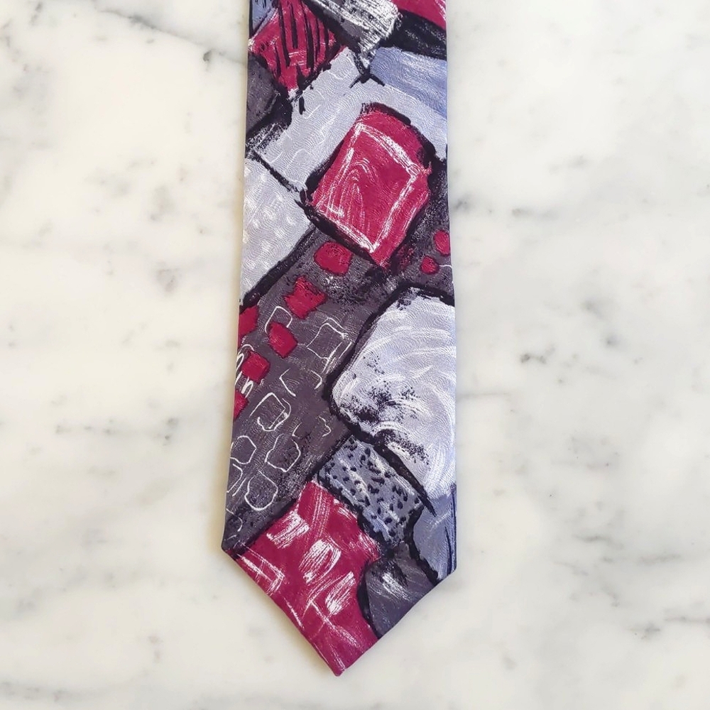 NWOT. Emilio Pucci 100% Italian Silk Tie with Multicolor Design Pattern.